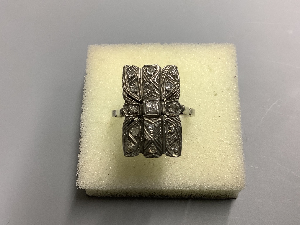 A mid 20th century 18ct white metal and diamond cluster set tablet ring